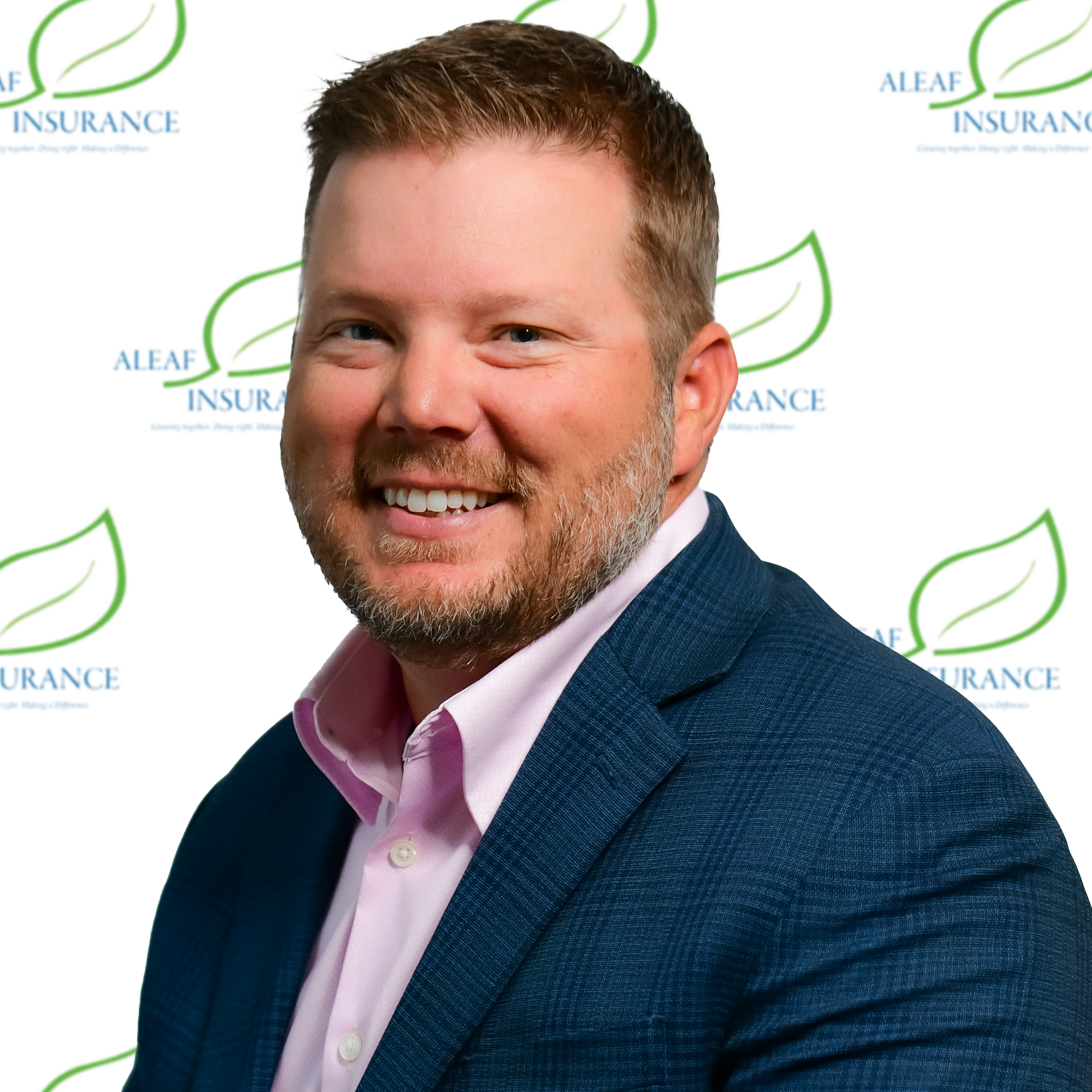 Smiling man in blazer and pink shirt; Aleaf Insurance logo backdrop.