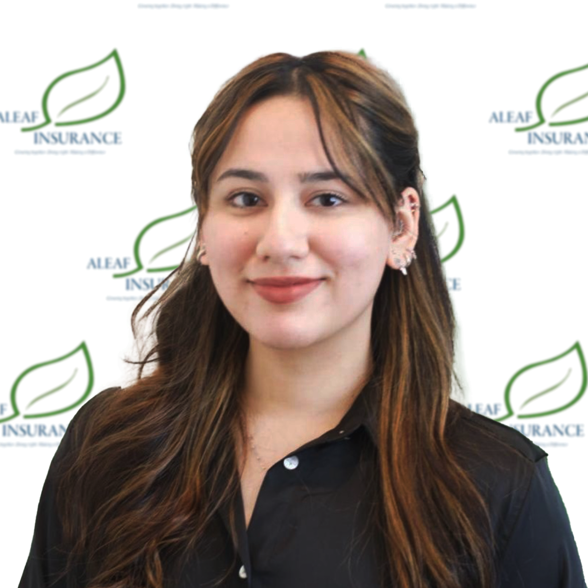Woman with long brown hair smiles, wearing a black shirt, in front of a logo background.