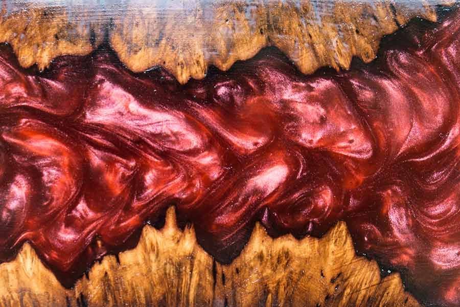 A Close up of a Piece of Wood with a red swirl on it — Crowfoot Constructions NSW, 2830