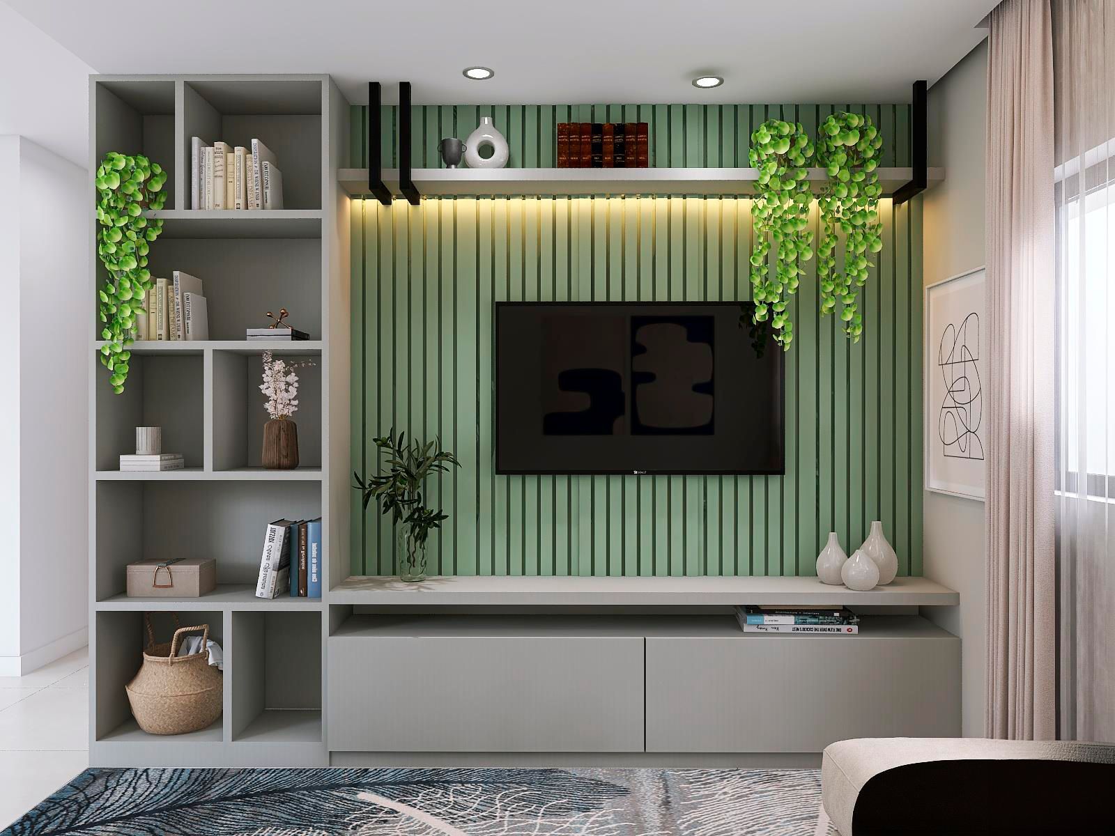 Uma sala com parede verde e TV de tela plana.