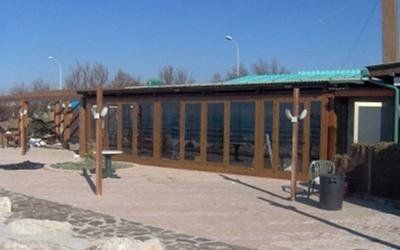 Veranda in legno e PVC vista laterale