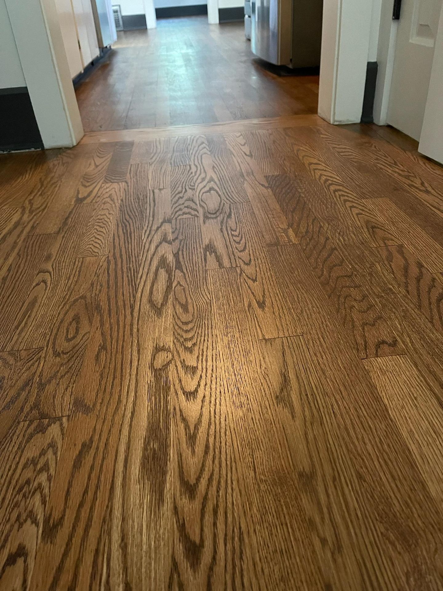 A close up of a wooden floor in a room