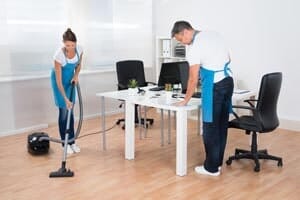 Janitors Cleaning In The Office — Commercial Cleaning In Ames, IA