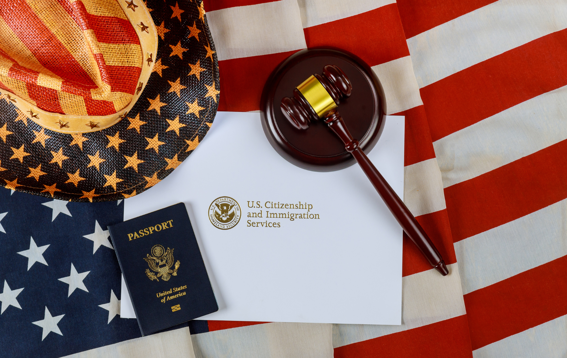 American flag, hat, gavel, passport, and official document.