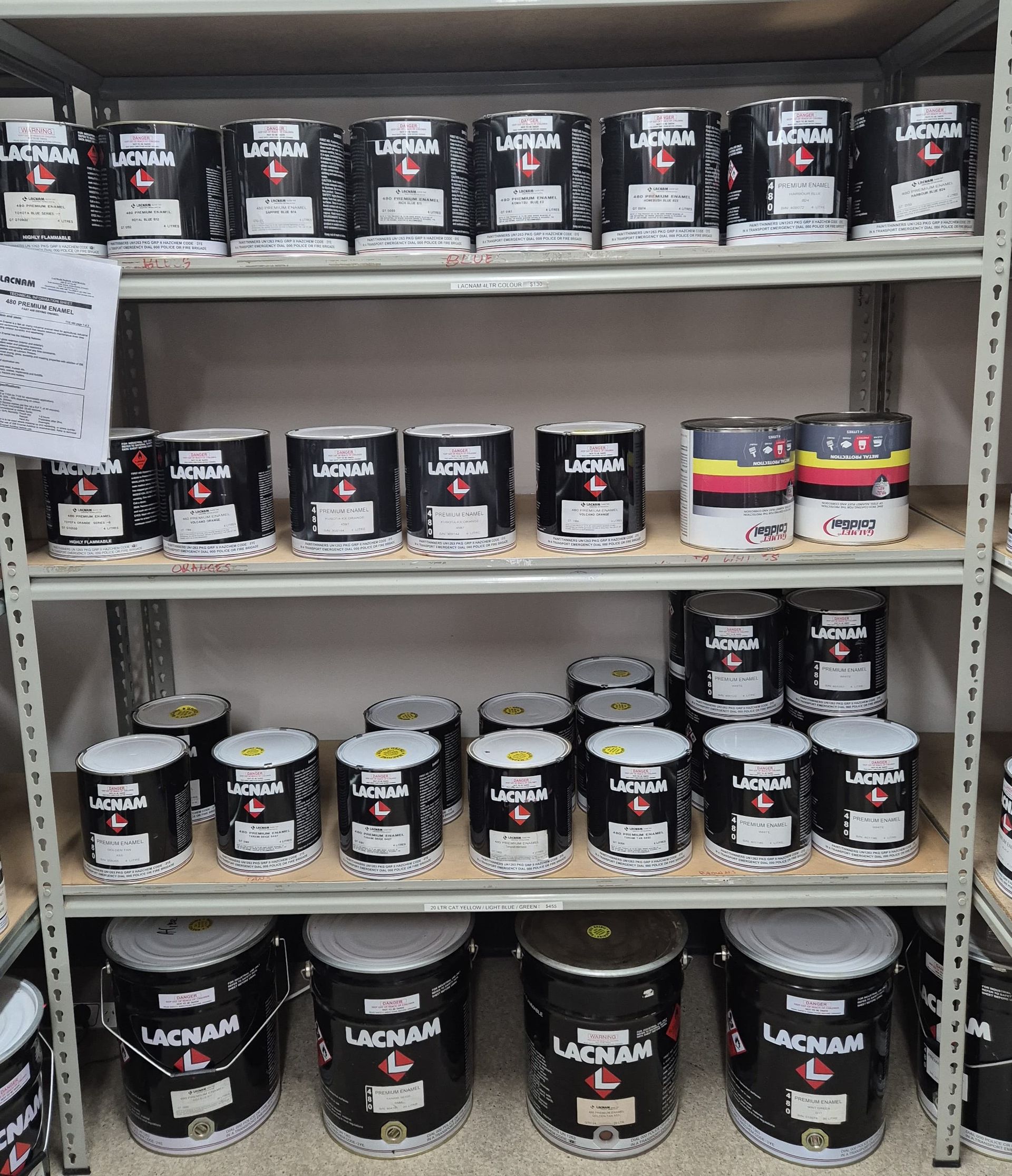 A Shelf Filled With Lots Of Cans Of Paint — Centre Trailer Hire and Parts In Ciccone, NT