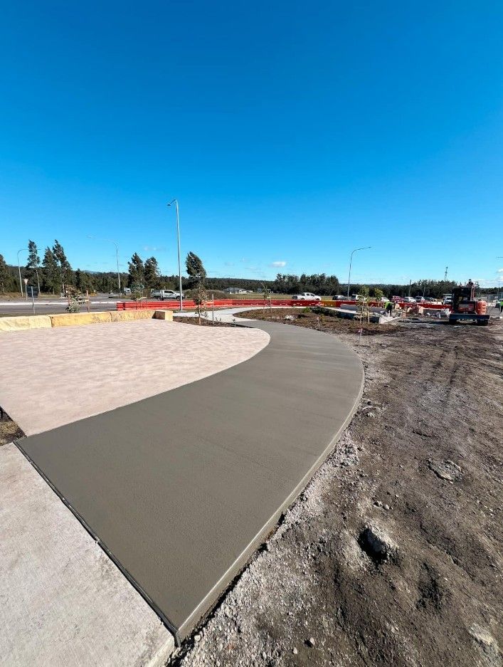 A Concrete Driveway of a House