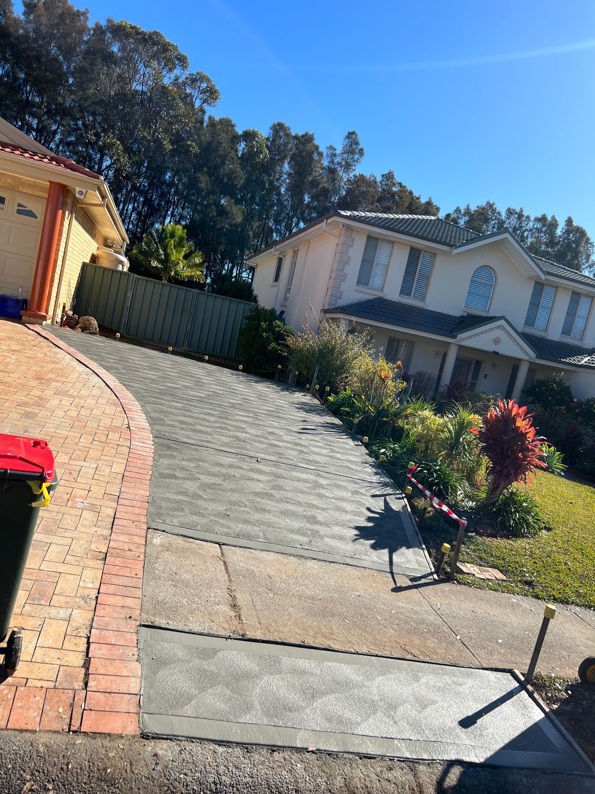 House With Walkout Deck and Concrete Walkway — Contact Our Concreters in Wyong NSW
