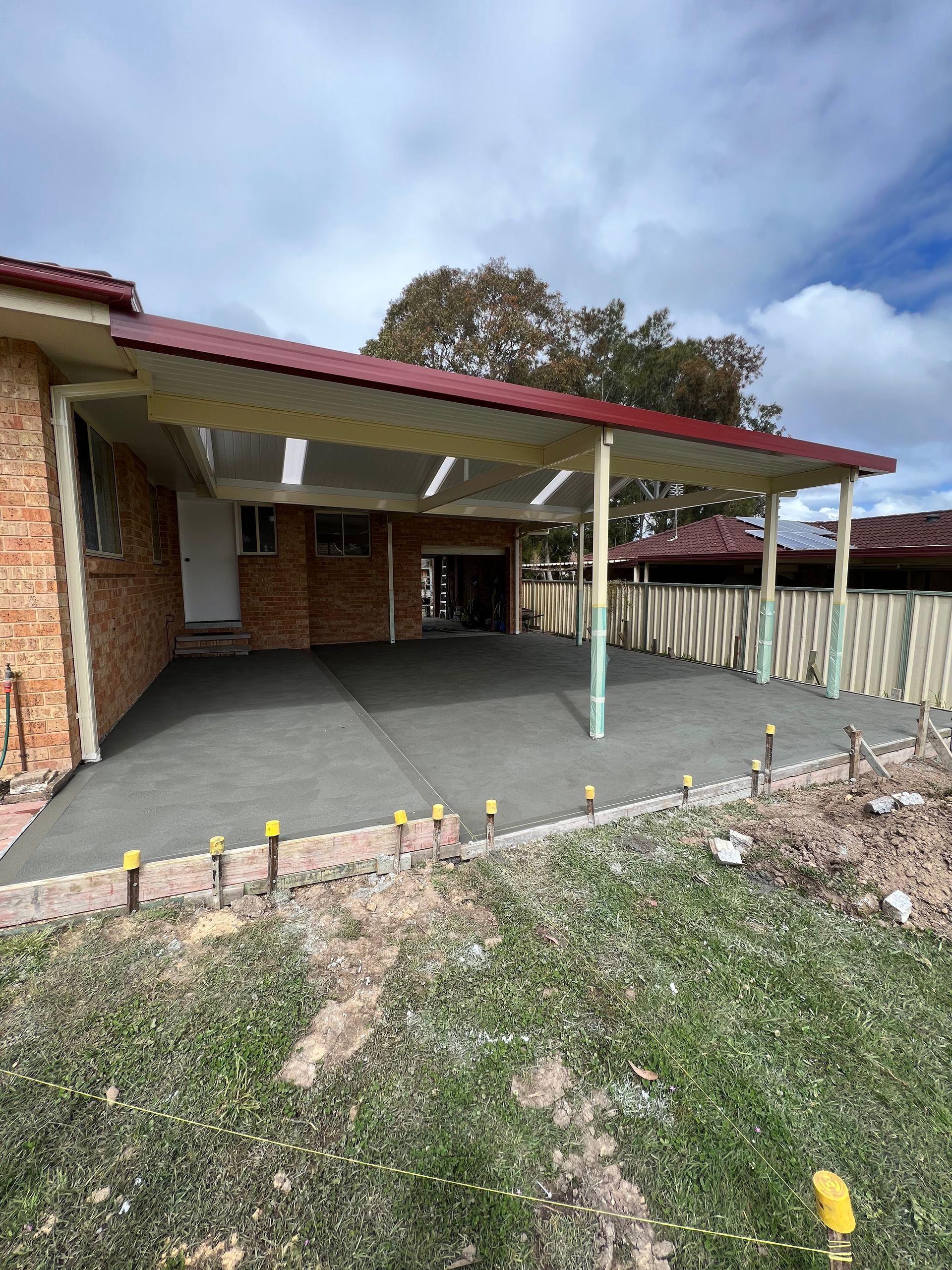 Concrete Paving Slabs in House Courtyard — Contact Our Concreters in Bateau Bay, NSW