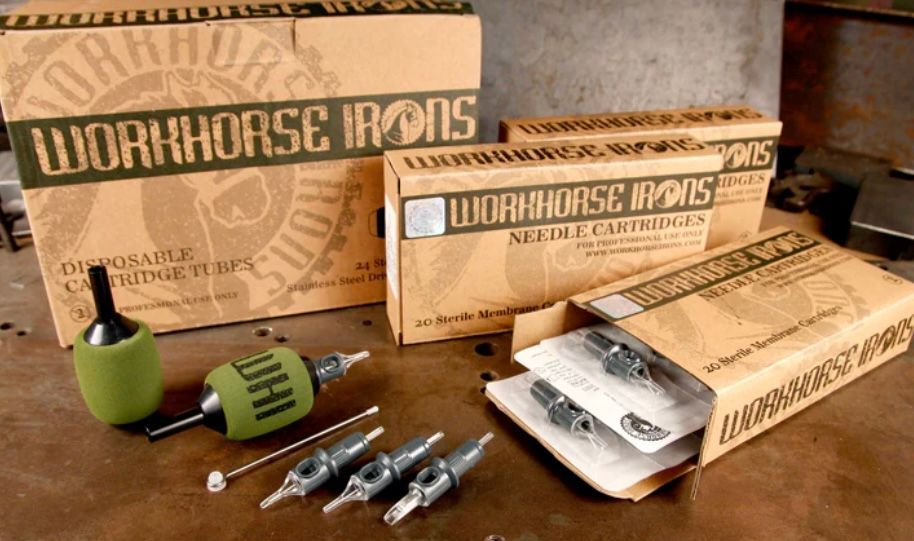 Boxes of workhorse irons needle cartridges on a table