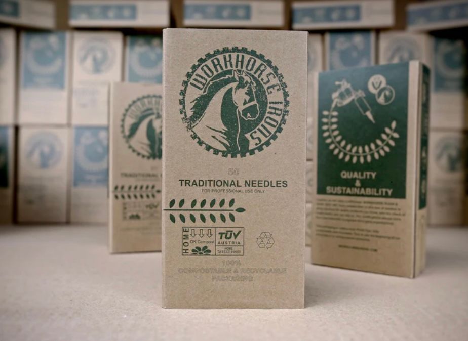 A box of workhorse rods traditional needles sitting on a table