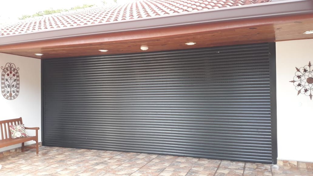 Roll Up Shutters — Gray Metal Roll Up Shutter in Miami, FL