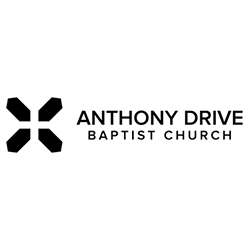 Logo for Anthony Drive Baptist Church: black geometric cross with church name in black text.