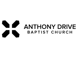 Logo for Anthony Drive Baptist Church: black geometric cross with church name in black text.