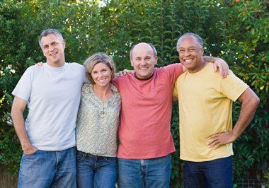 Group of middle aged friends - hair restoration services in Tucson, AZ