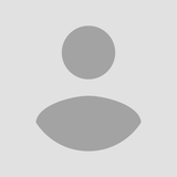 Gray silhouette of a person, consisting of a circle for the head and an oval for the body.