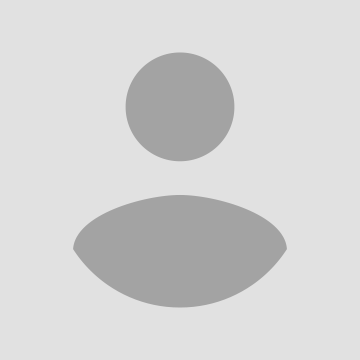 Gray silhouette of a person, consisting of a circle for the head and an oval for the body.