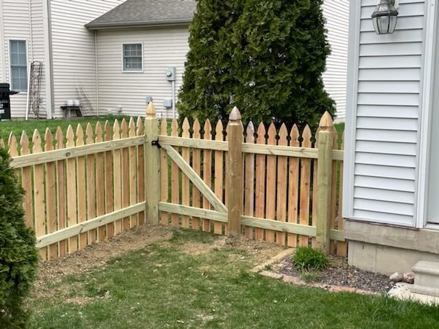 A wooden picket fence.