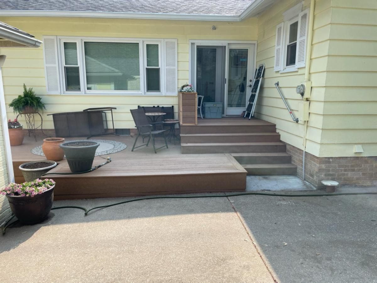 A house with a deck and stairs.