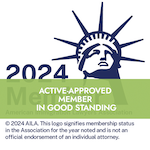 2024 membership badge for the American Immigration Lawyers Association (AILA), featuring the Statue of Liberty.