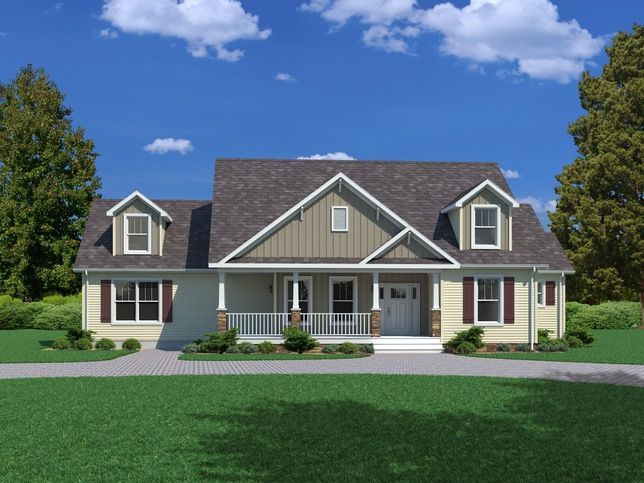 Suburban house with gray siding, white trim, a front porch, and a manicured green lawn under a blue sky.