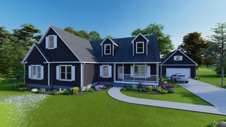 Blue suburban house with white trim, front porch, driveway, and a manicured lawn under a clear sky