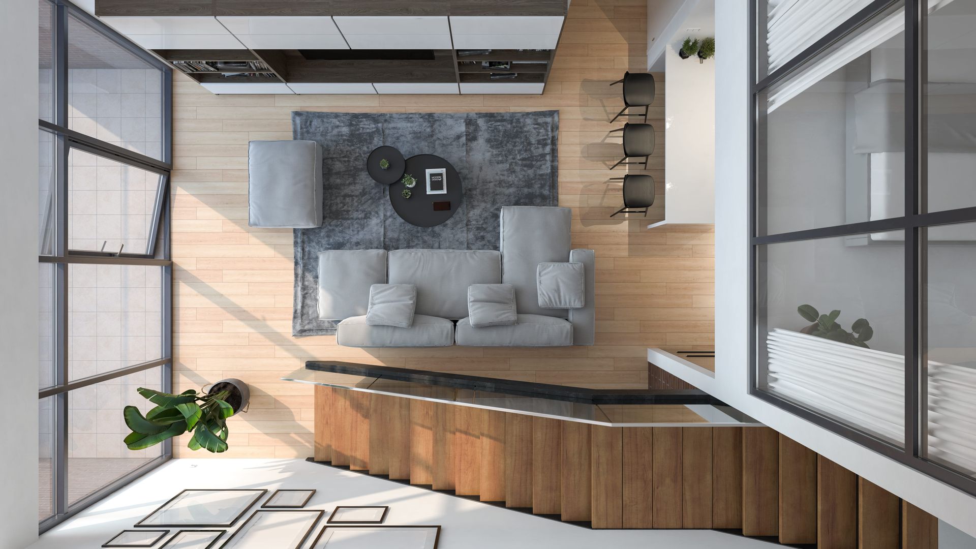 An aerial view of a living room with a couch and stairs.