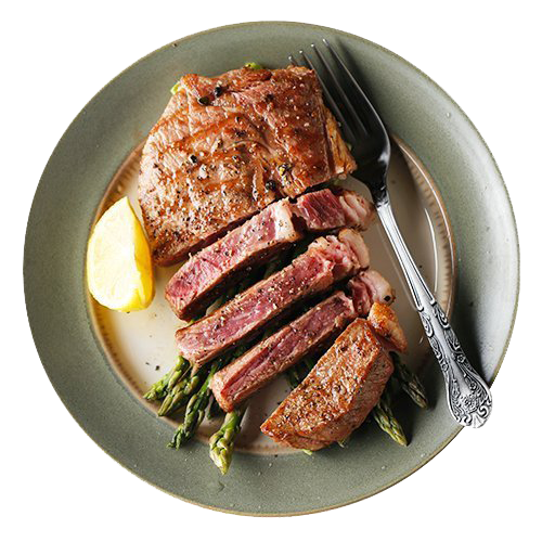 A plate of beef sirloin steak and asparagus with a fork on it.