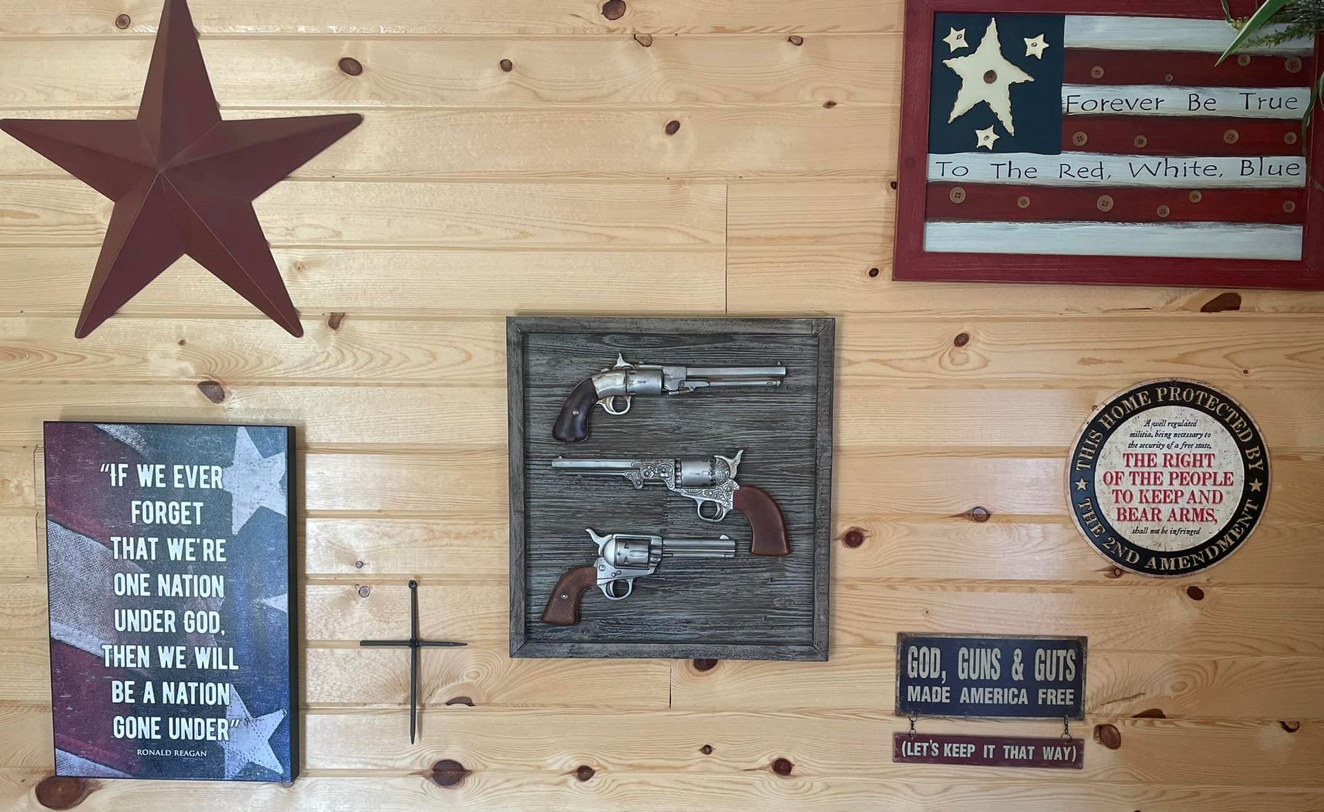 A wooden wall with a few signs on it