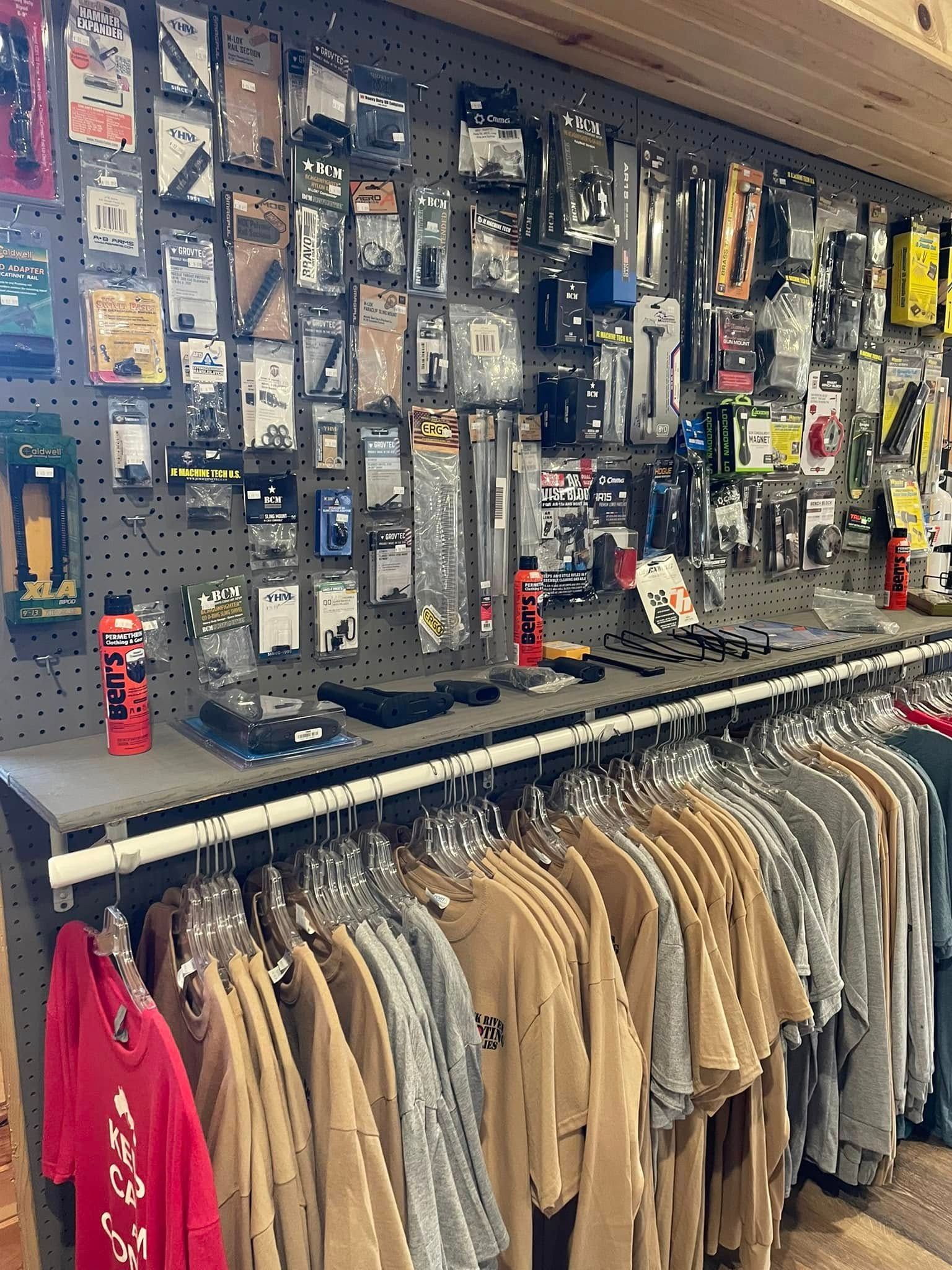 A store filled with lots of clothes and tools.