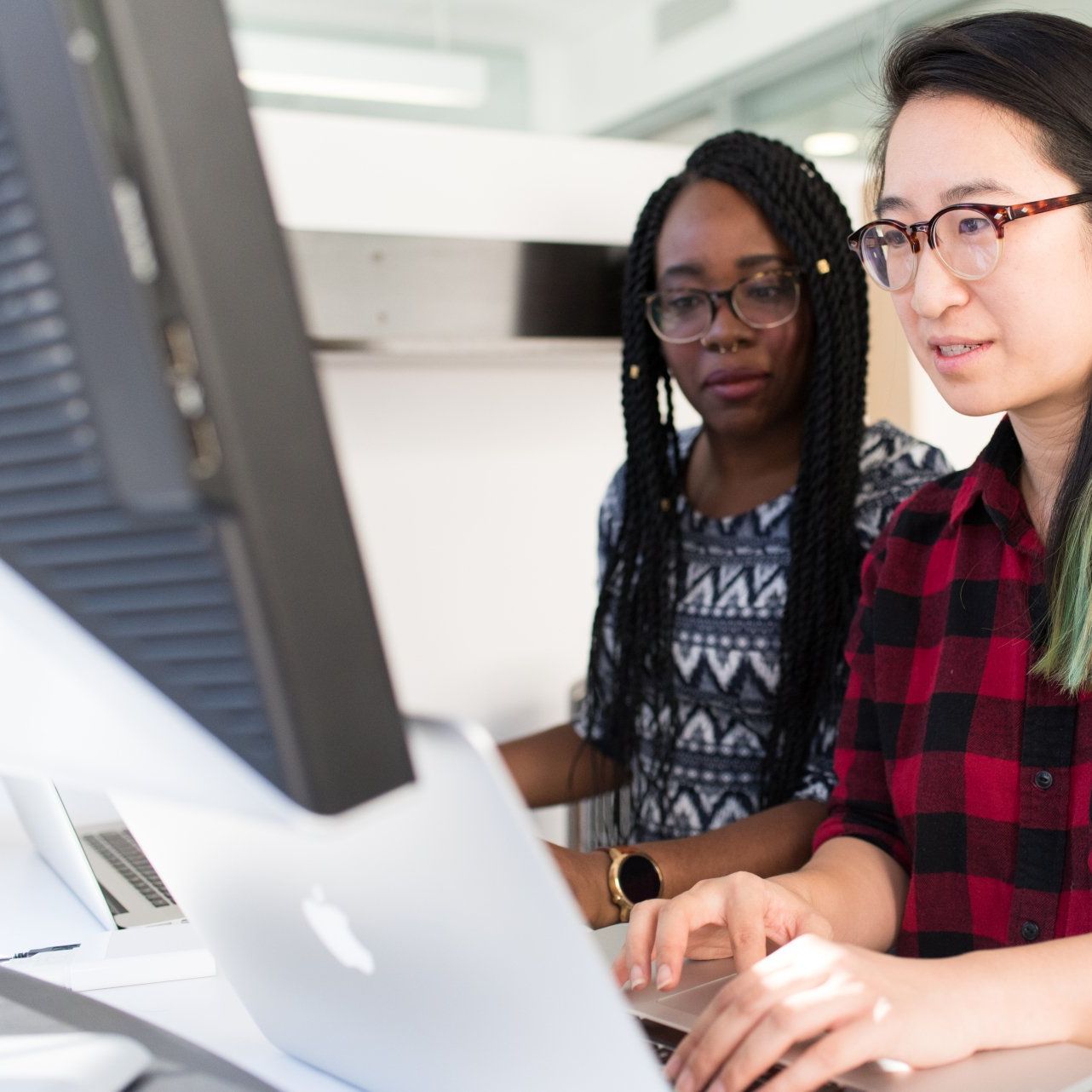 Two People at a Computer