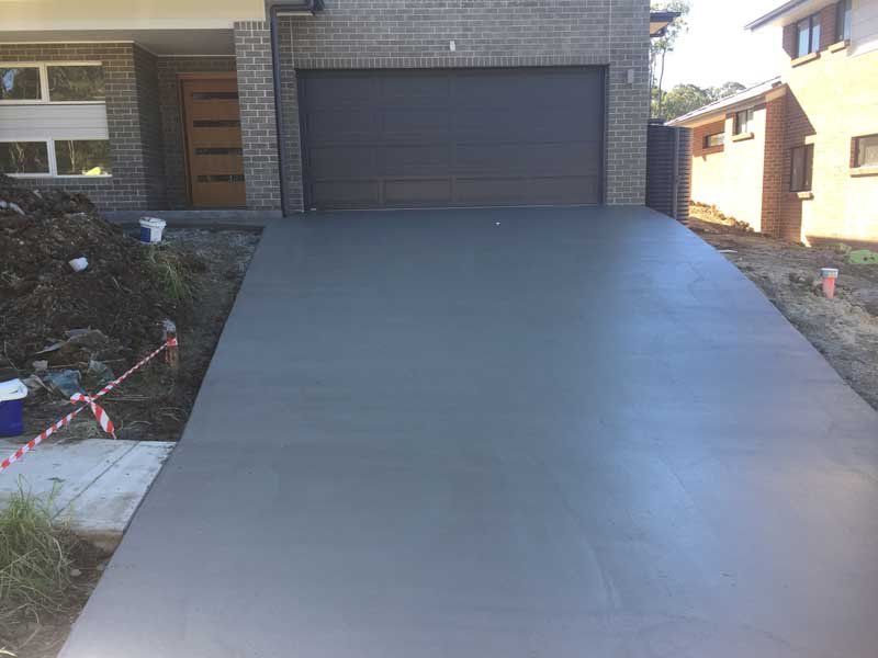front side of new concrete driveway