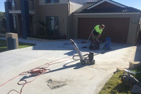 t and t coastal concreting working cleaning concrete