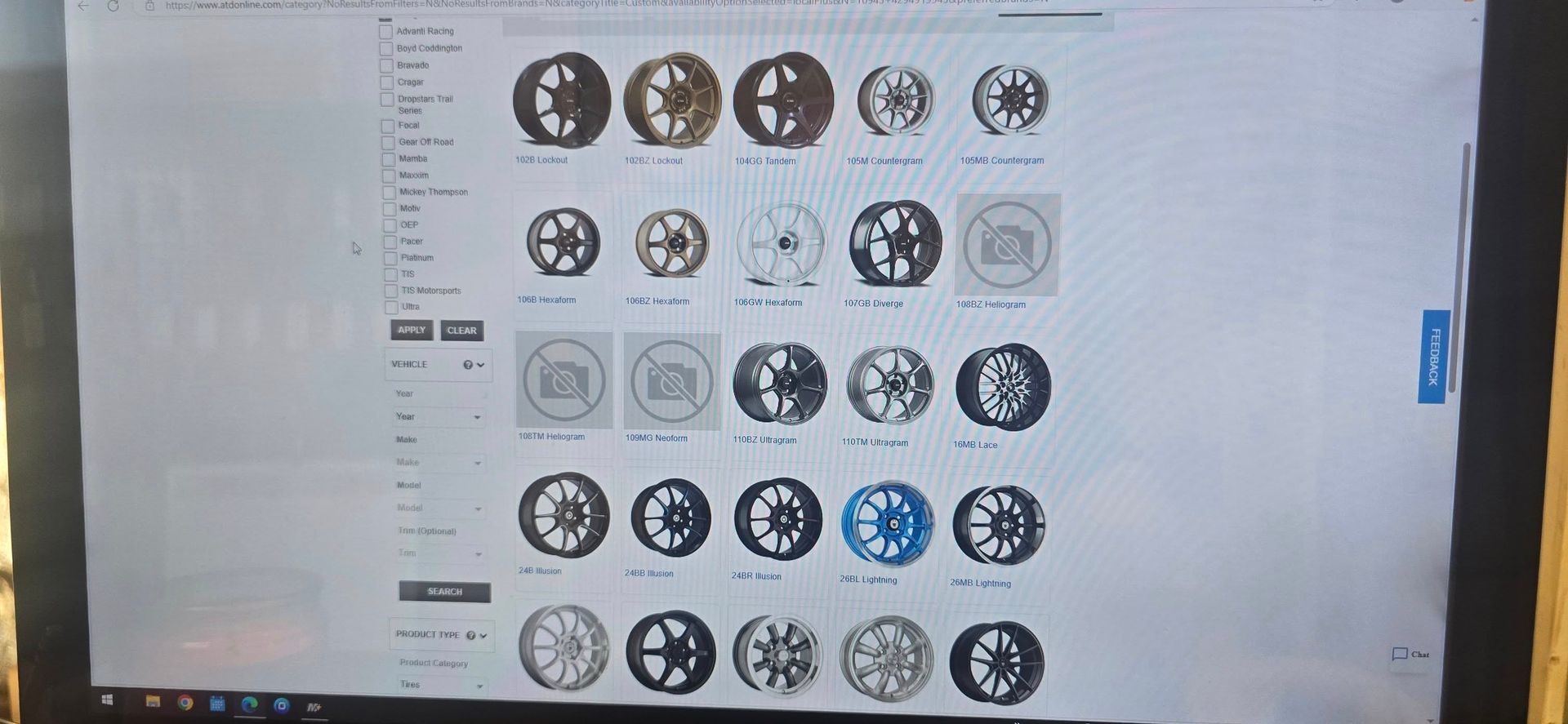 A computer screen displaying a webpage showing different car rims.