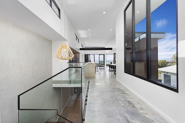 the pathway from the stairs to the living area