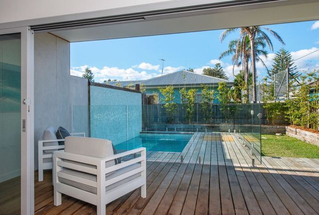 wooden deck and outdoor pool