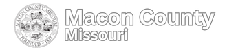 A black and white logo for macon county missouri