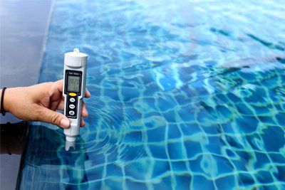 Swimming Pool & Spa Construction & Contractors — Checking Salt Meter Level of Pool in Gainesville, FL