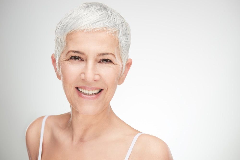 Woman With Short Blonde Hair — Beauty Clinic Bundaberg, QLD