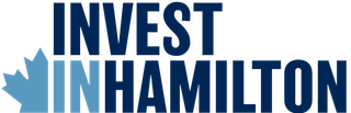 Invest In Hamilton logo in dark blue and light blue with a stylized maple leaf icon.