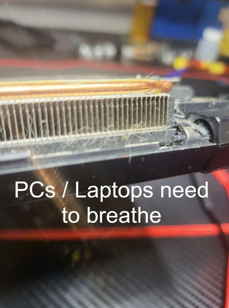 Fan vent on laptop clogged.