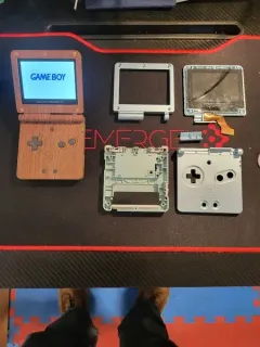 A game boy is sitting on top of a table