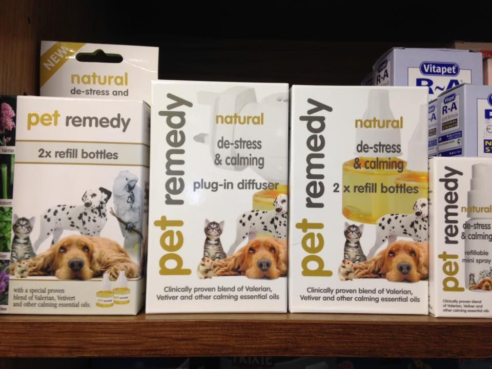 Several boxes of pet remedy sit on a shelf