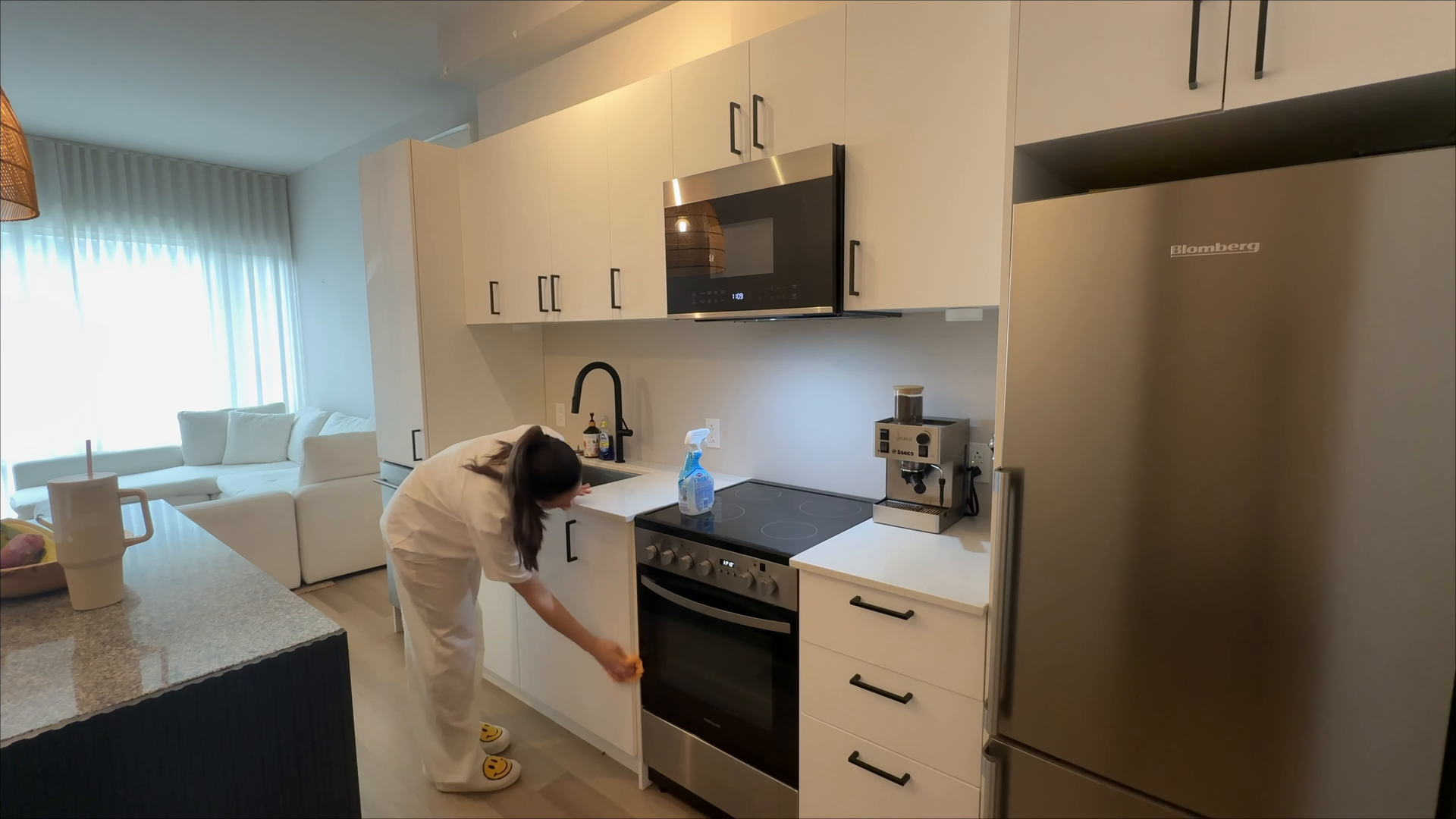 Cleaner completing a weekly apartment cleaning in Gowanus Brooklyn NYC