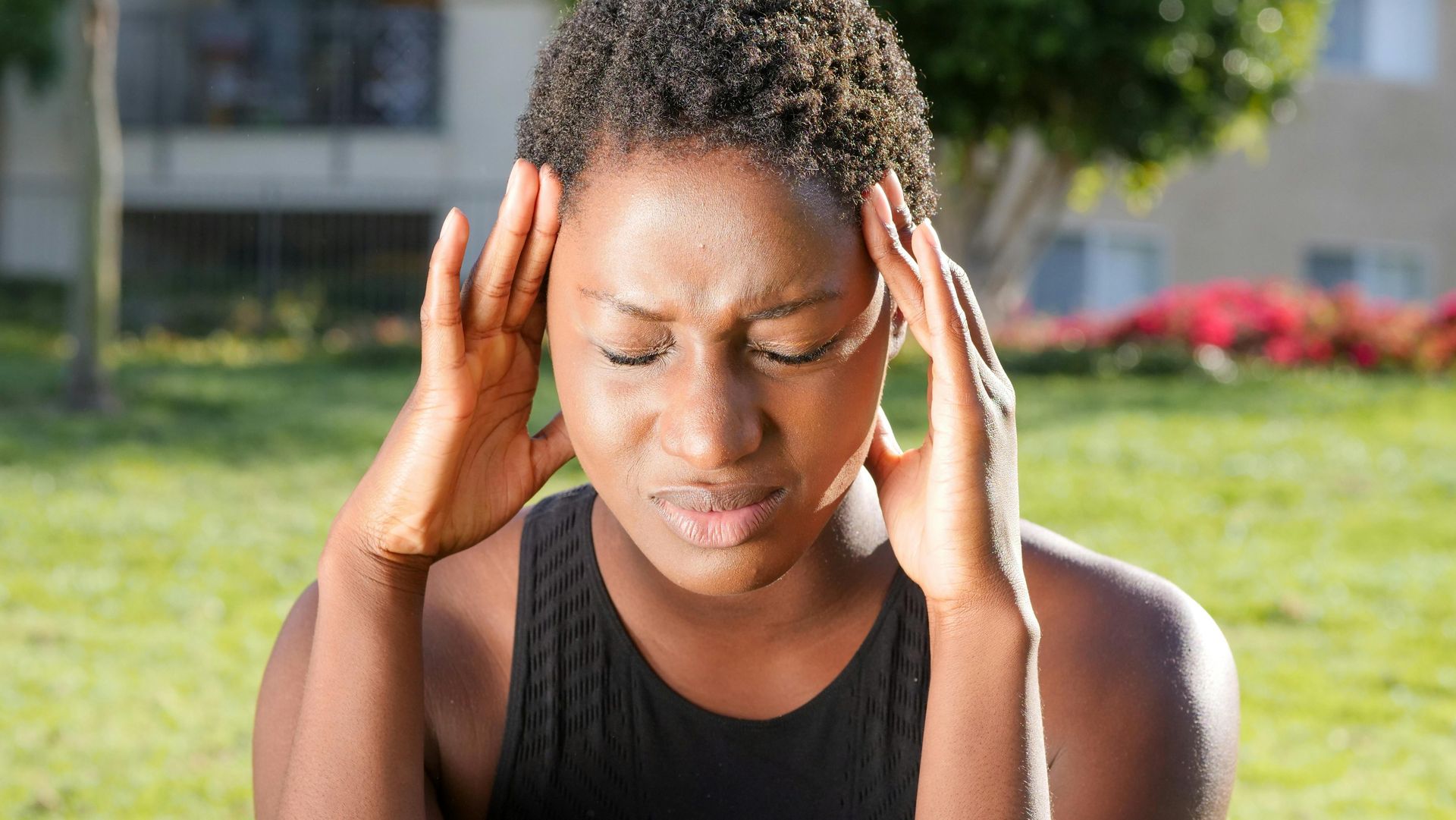 Woman suffering migraine