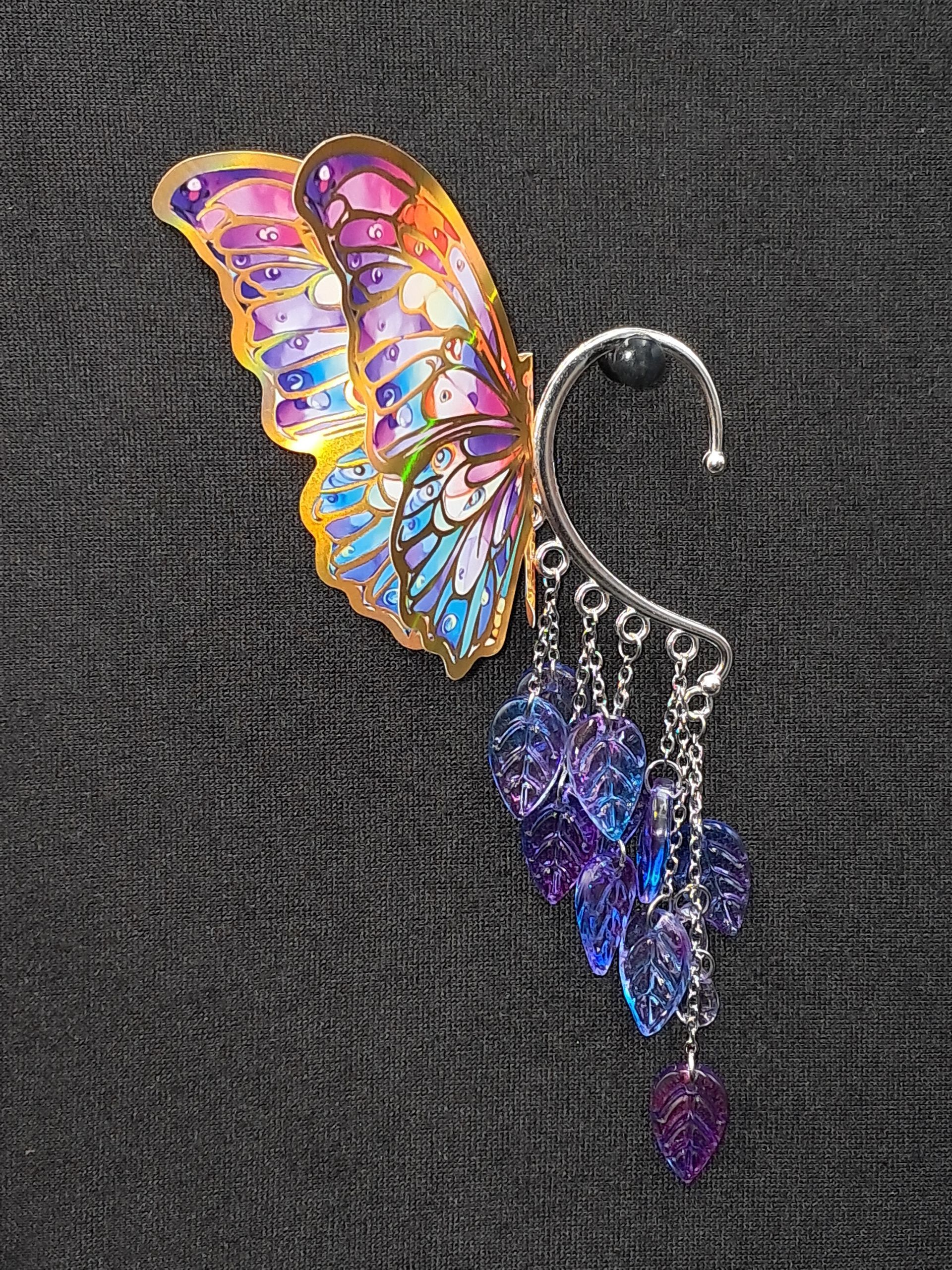 zilverkleurige blauw/paarse vlinder  met glazen  blauw paarse blaadjes