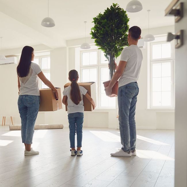 happy family moving into renovated home