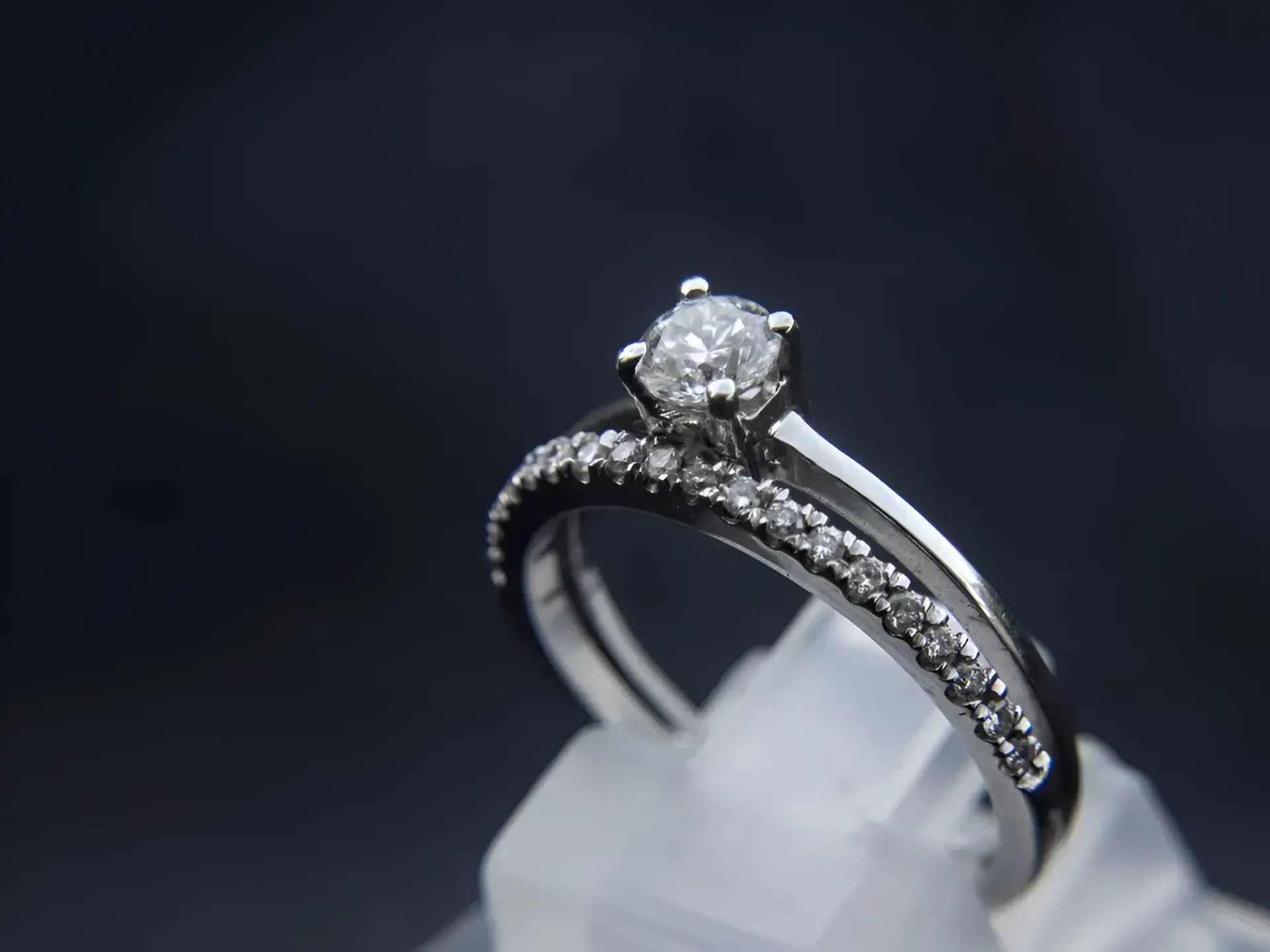 A White Gold Ring With a Diamond in the Center — K. Smith & Son Jewellers In Caloundra, QLD