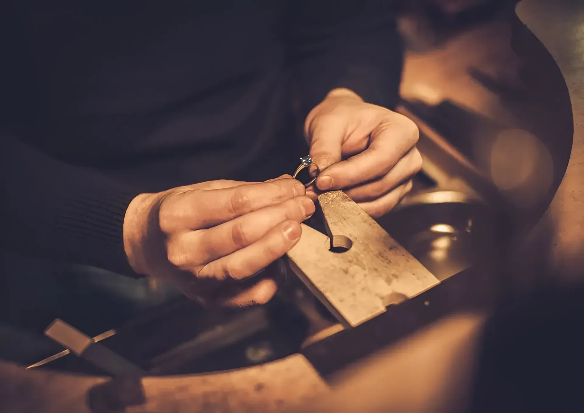 A Close Up of a Person Making a Ring on a Workbench — K. Smith & Son Jewellers In Caloundra, QLD