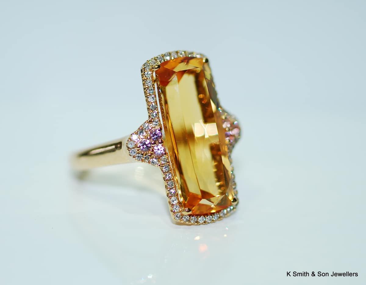 Gold Ring with A Rectangular Yellow Gemstone, Surrounded by Smaller Stones — K. Smith & Son Jewellers In Caloundra, QLD
