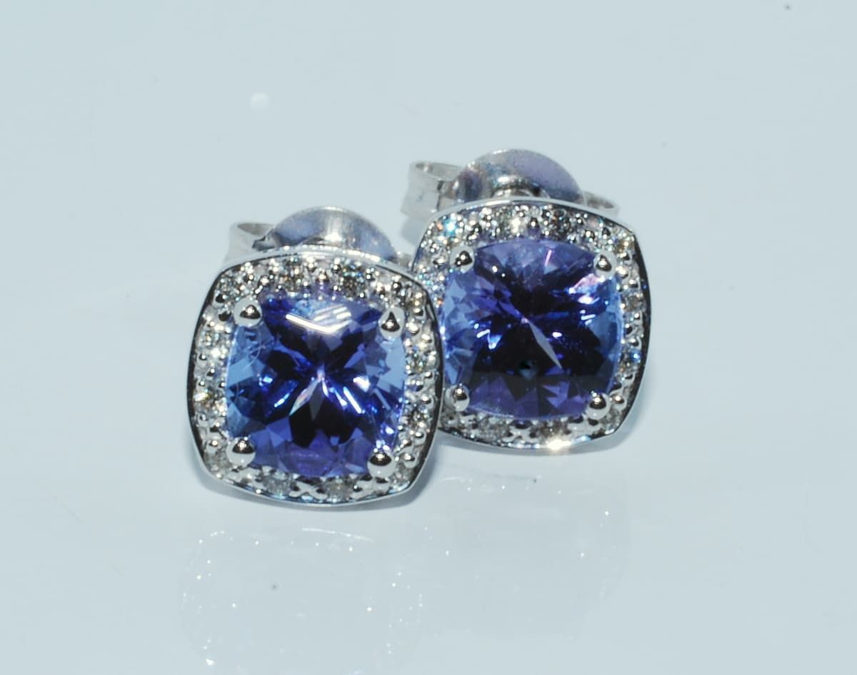 Pair of Square Tanzanite Stud Earrings Set in Silver with A Halo of Small White Stones — K. Smith & Son Jewellers In Caloundra, QLD